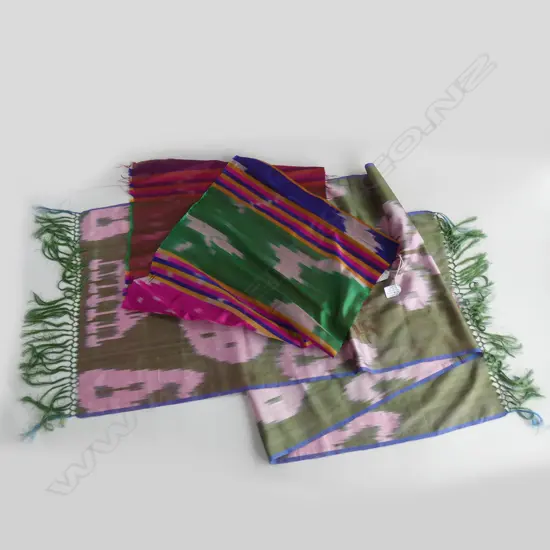 Two jewel toned hand woven silk ikats, both purchased in Samarkand, Uzbekistan…